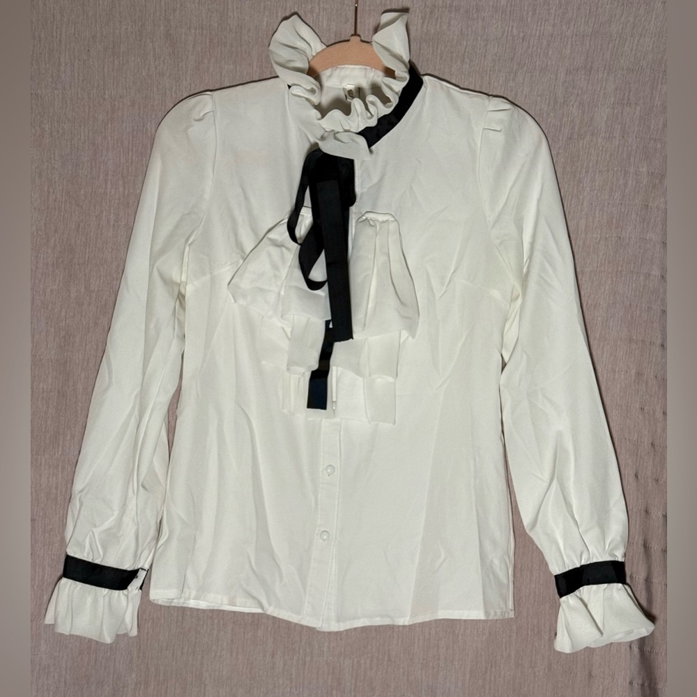 Ruffled Tie-Neck Blouse in White with Black Trim